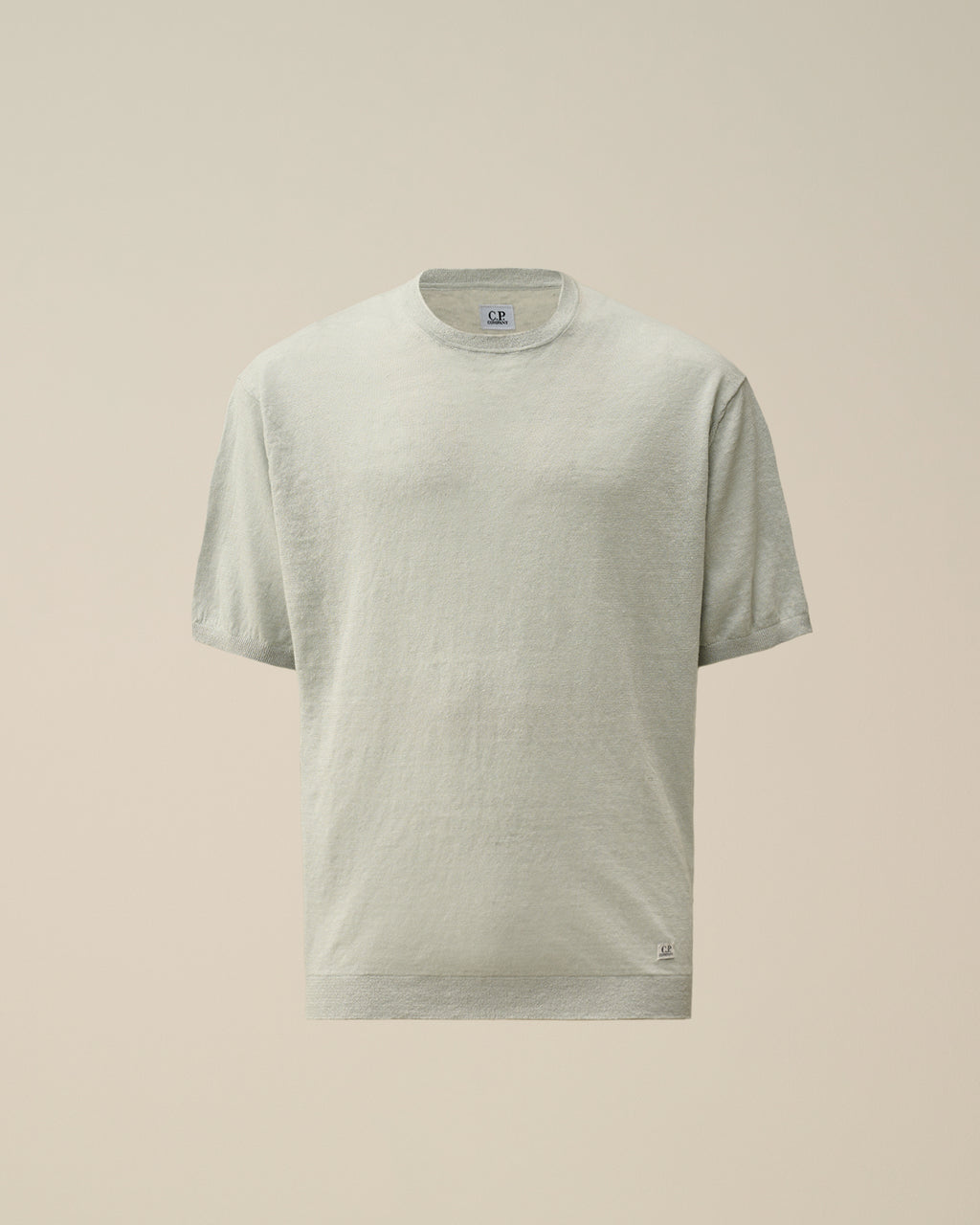 Dettaglio logo su maglia ghiaccio nan logo Riquadro lino con dettagli chiari