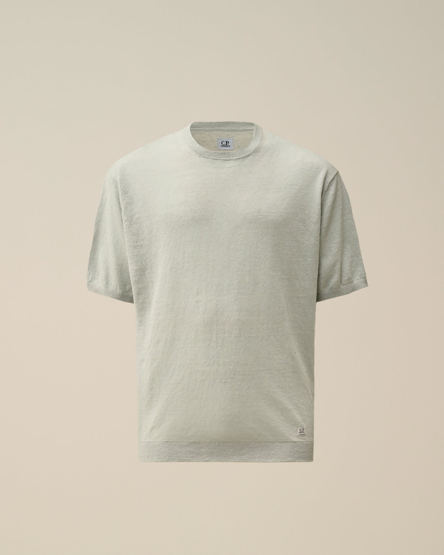 Dettaglio logo su maglia ghiaccio nan logo Riquadro lino con dettagli chiari