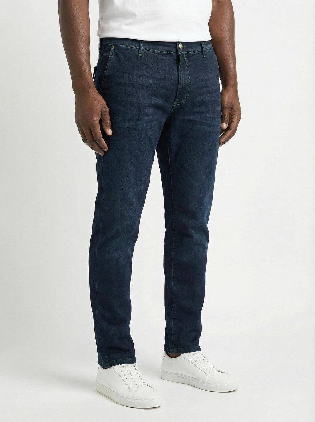 Front view of model wearing slim‑fit jeans dark wash Jacob Cohen in premium fabric
