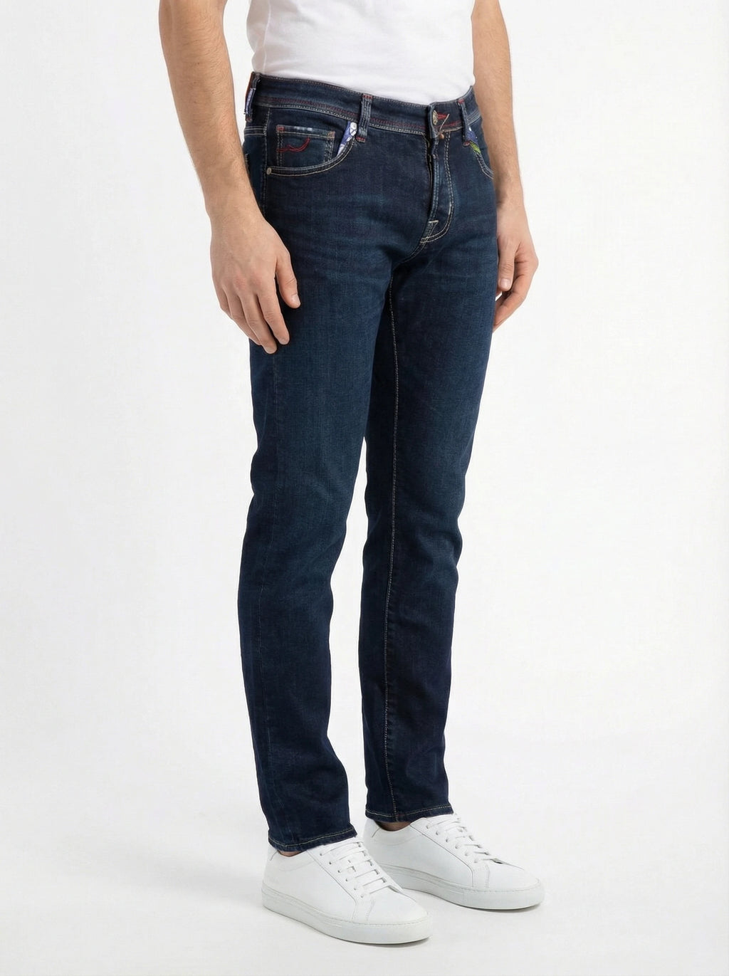 Front view of model wearing slim‑fit jeans dark wash Jacob Cohen denim