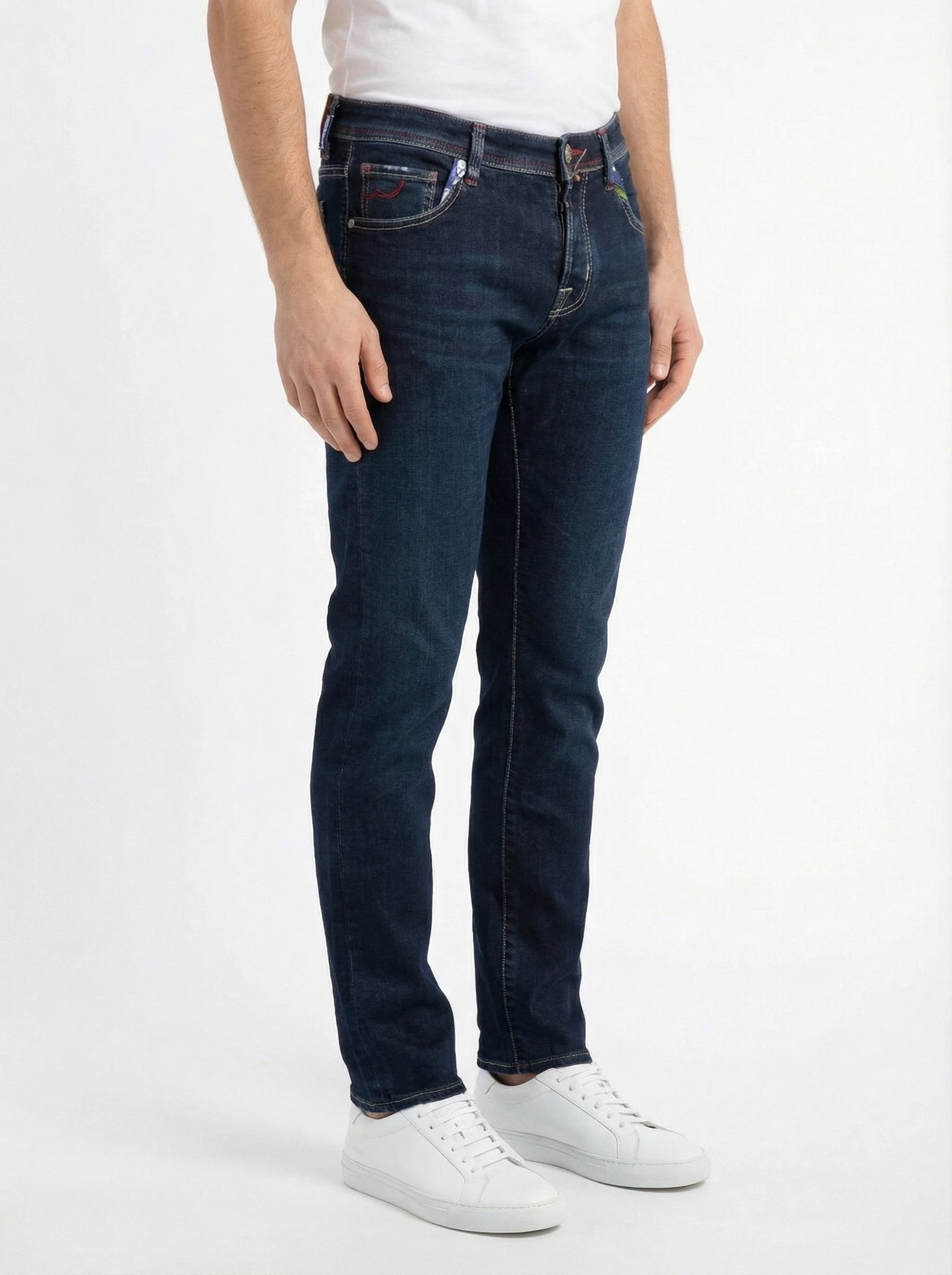 Front view of model wearing slim‑fit jeans dark wash Jacob Cohen denim