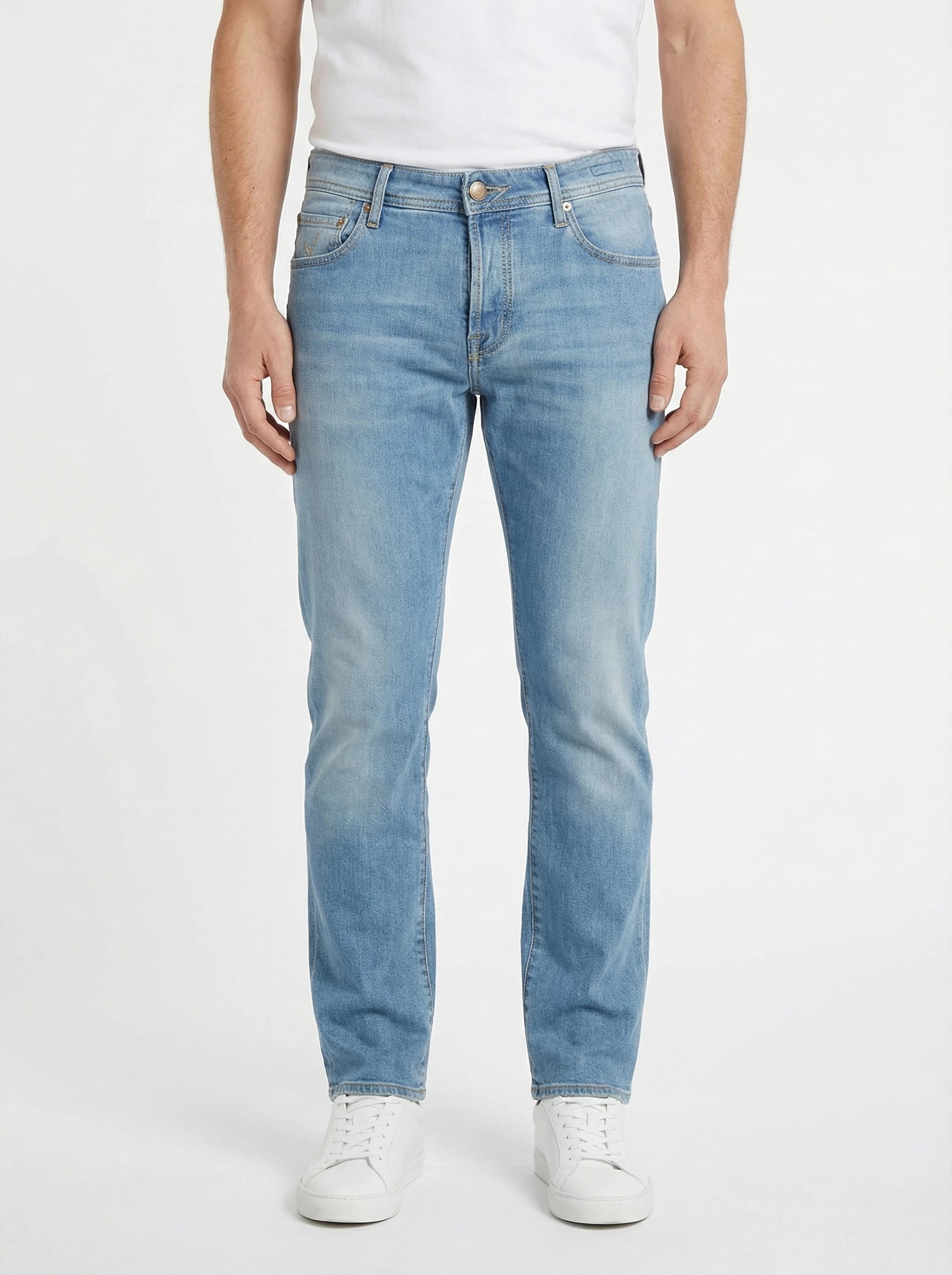 Back view of model wearing jeans straight leg light wash Jacob Cohen in premium fabric