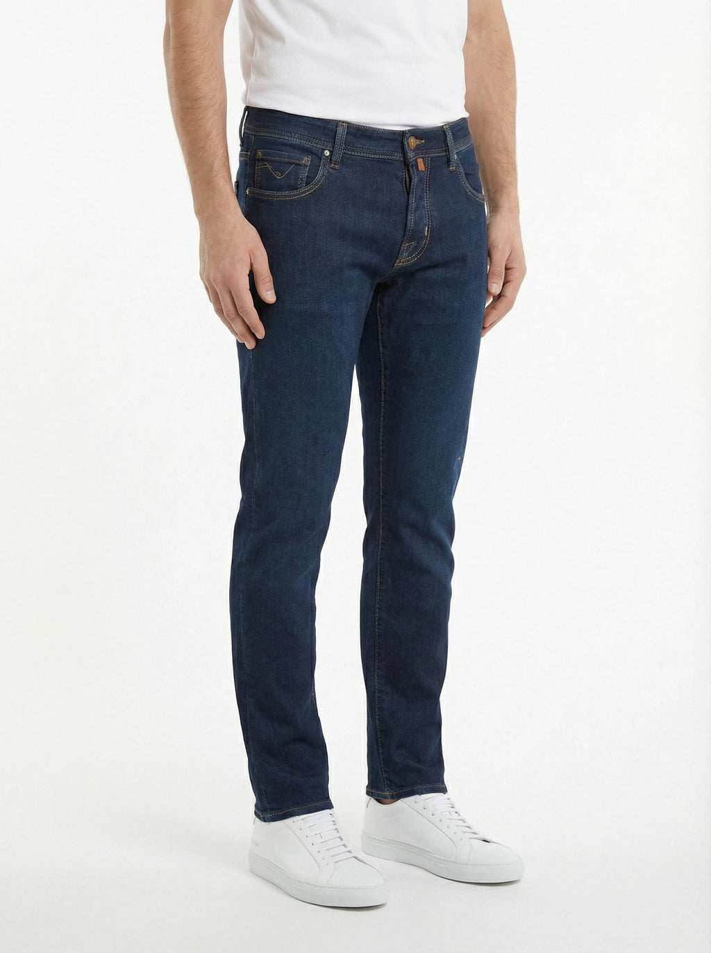 Front view of model wearing slim‑fit jeans dark wash Jacob Cohen in premium fabric
