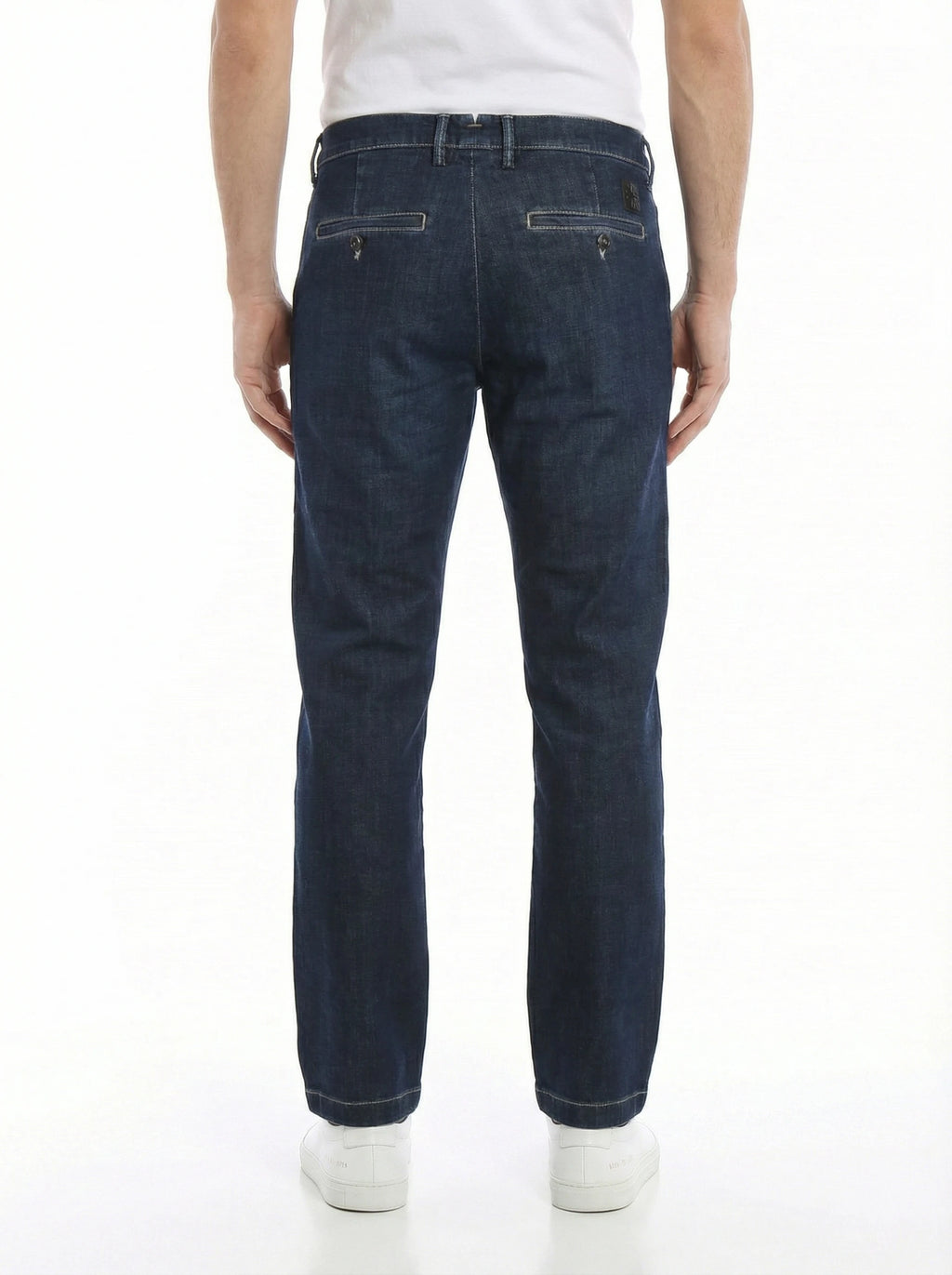 Back view of model wearing slim‑fit jeans dark wash Jacob Cohen in premium fabric