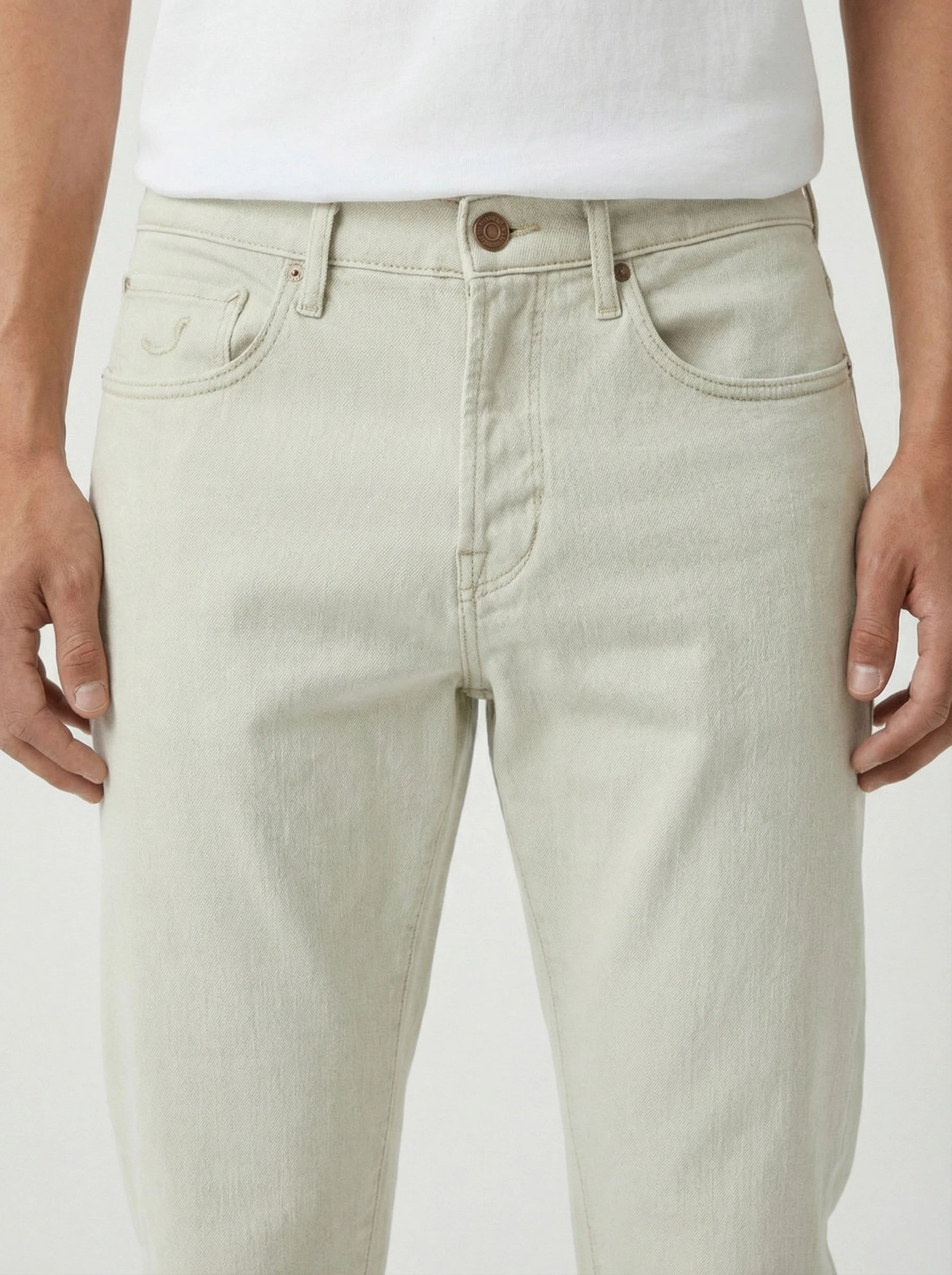 Back view of model wearing jeans straight leg white Jacob Cohen in premium fabric