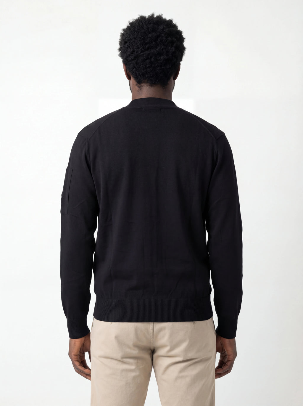 Modello a 45° con cardigan nero taschino manica a rilievo C.P. Company da uomo