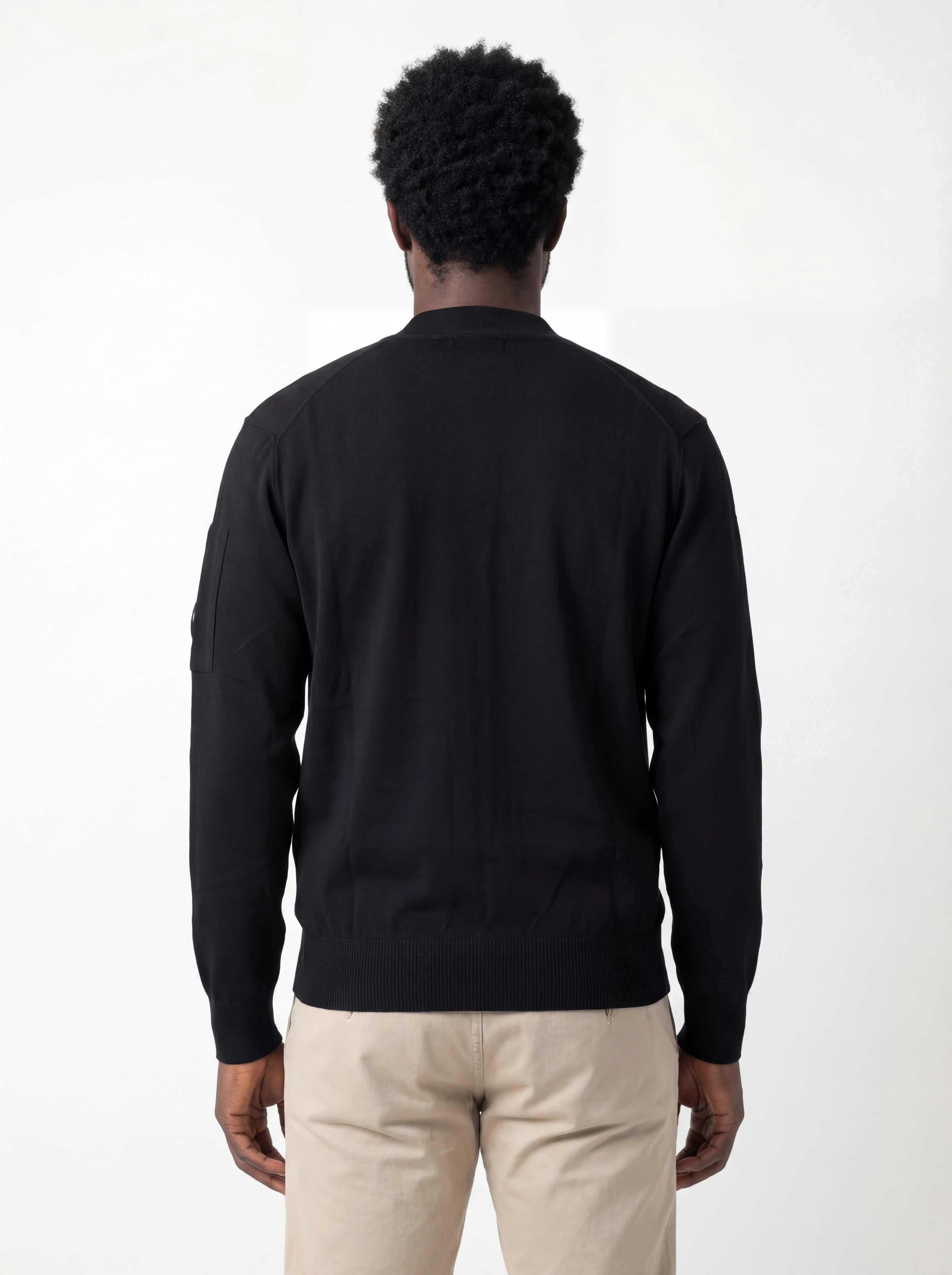 Modello a 45° con cardigan nero taschino manica a rilievo C.P. Company da uomo