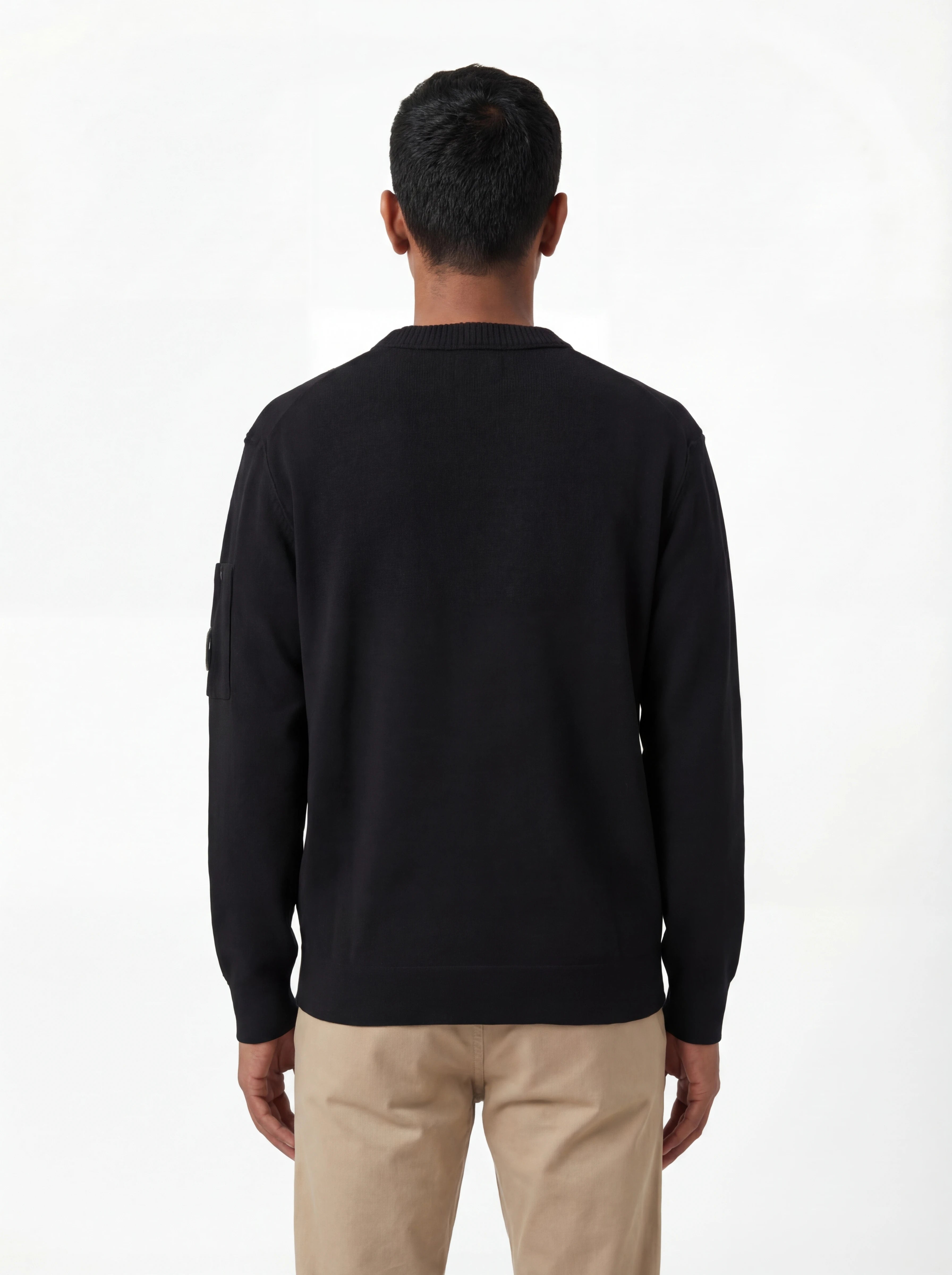 Modello a 45° con maglia girocollo nero taschino con lente taschino C.P. Company da uomo in cotone