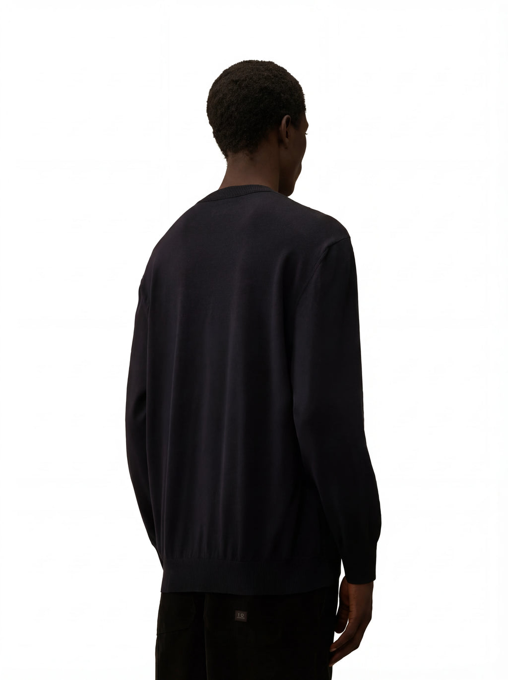 Modello a 45° con maglia girocollo blu taschino con lente taschino C.P. Company da uomo in lana merino extrafine