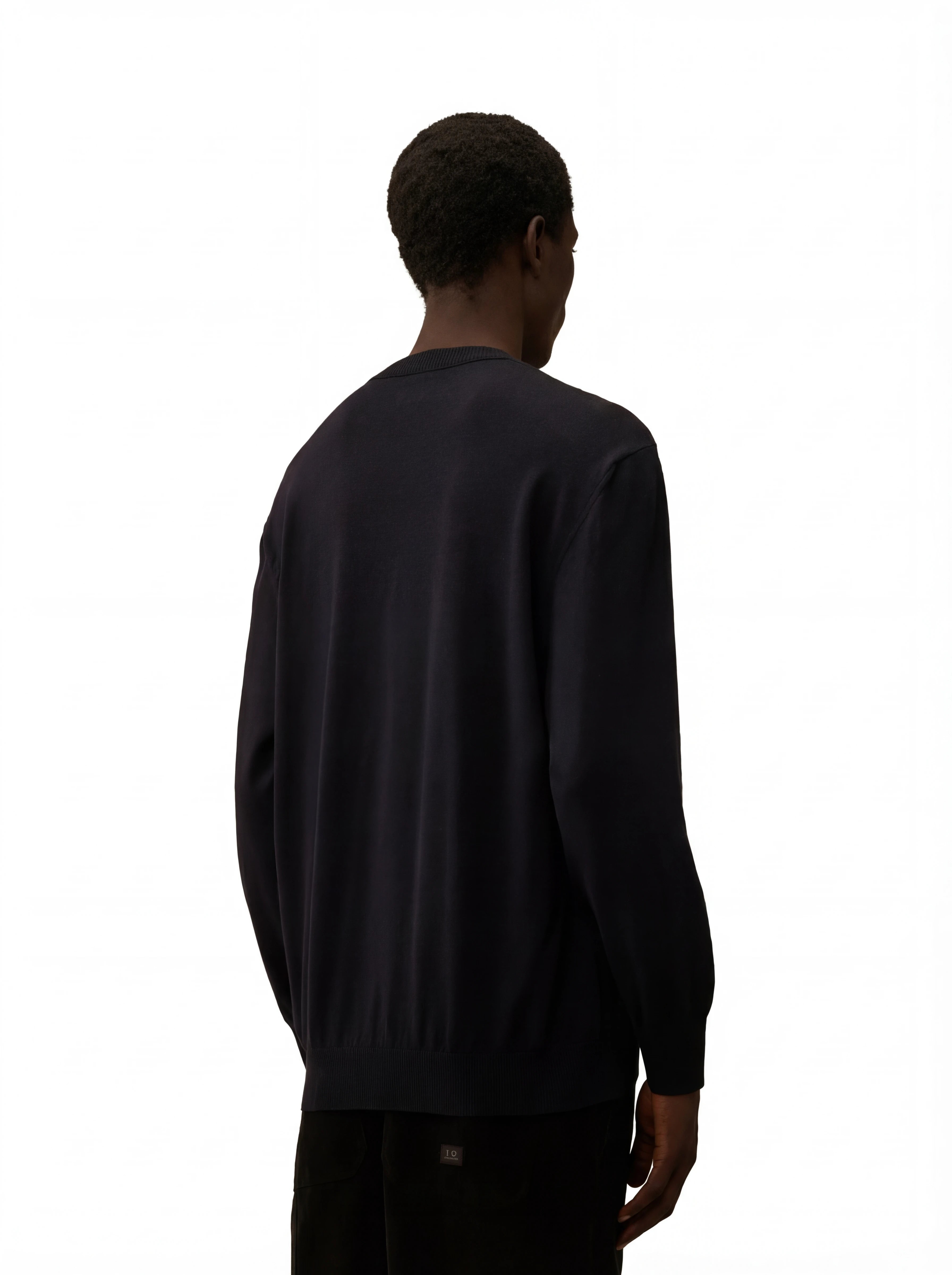 Modello a 45° con maglia girocollo blu taschino con lente taschino C.P. Company da uomo in lana merino extrafine