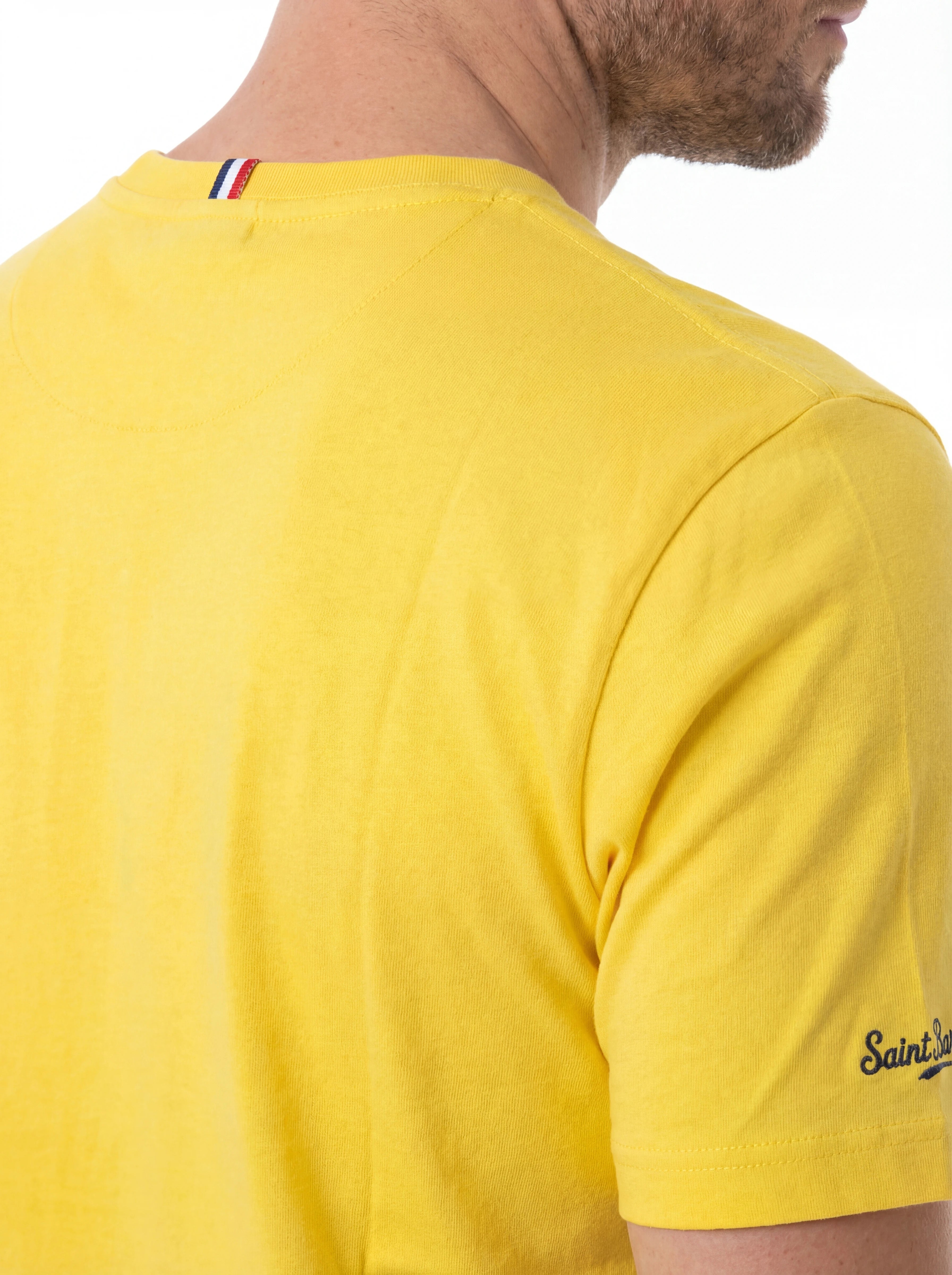 T-shirt su sfondo neutro frontale t-shirt giallo scritta “Los Angeles” Saint Barth cotone