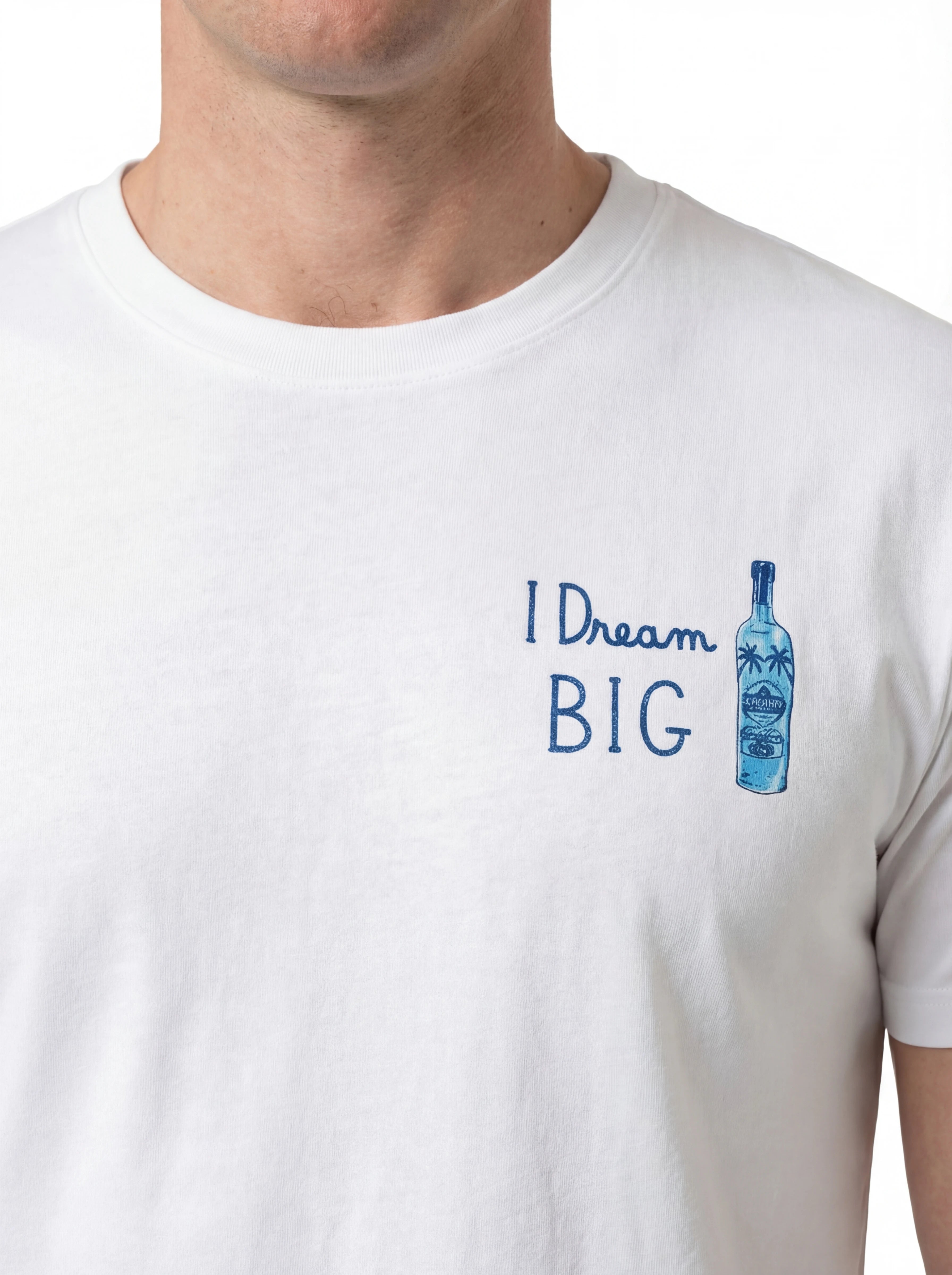 T-shirt su sfondo neutro frontale t-shirt bianco scritta “I Dream BIG” Saint Barth cotone