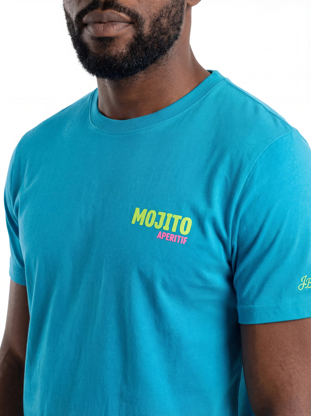 T-shirt su sfondo neutro frontale t-shirt turchese scritta “MOJITO APERITIF” Saint Barth cotone