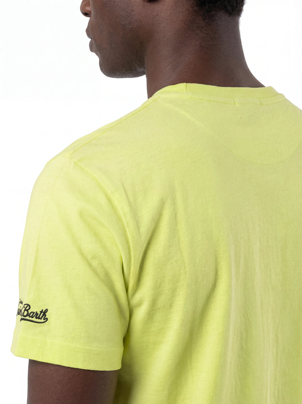 Vista da dietro t-shirt giallo fluo scritta “Ibiza vs Mykonos” Saint Barth cotone