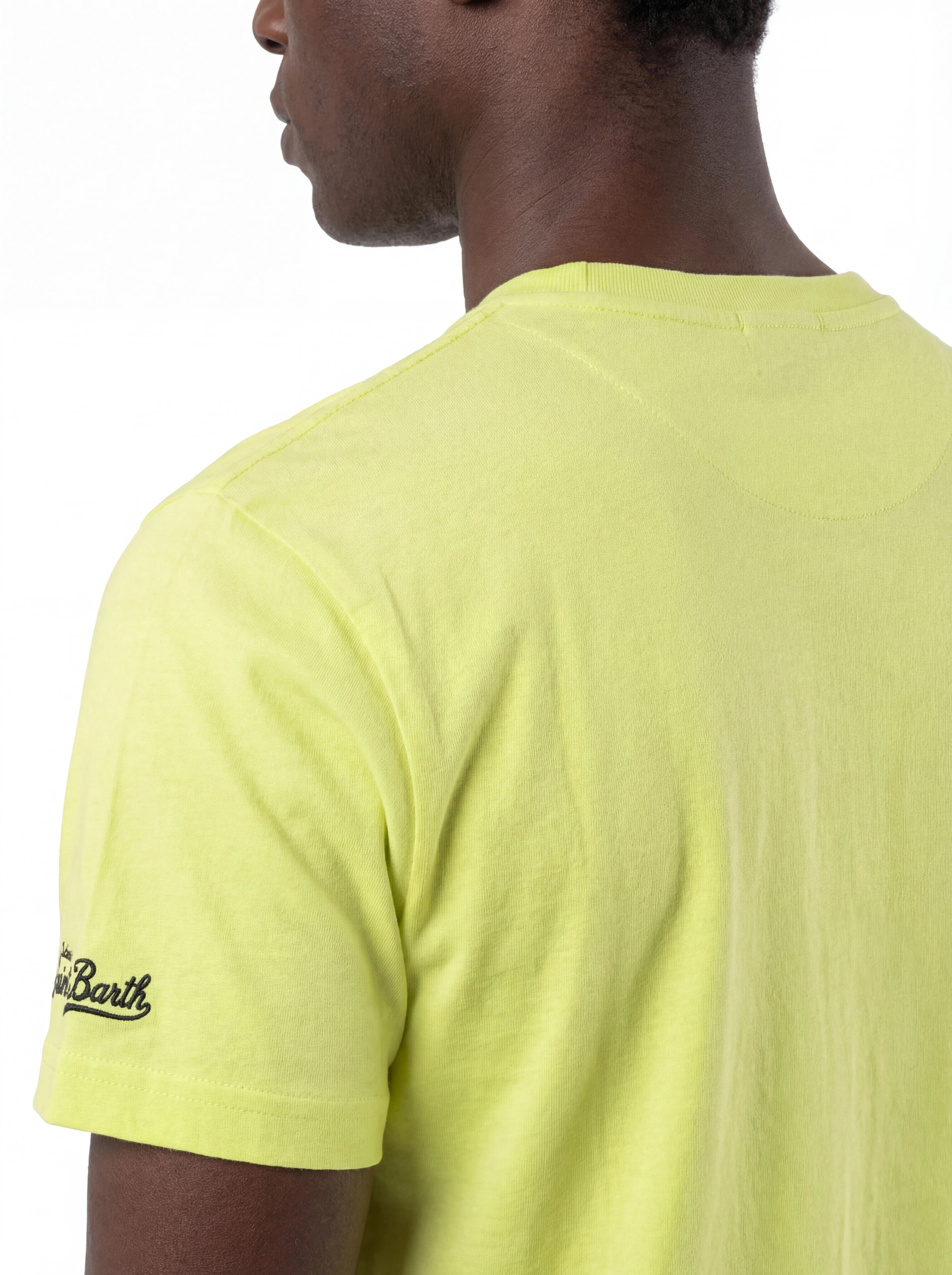 Vista da dietro t-shirt giallo fluo scritta “Ibiza vs Mykonos” Saint Barth cotone