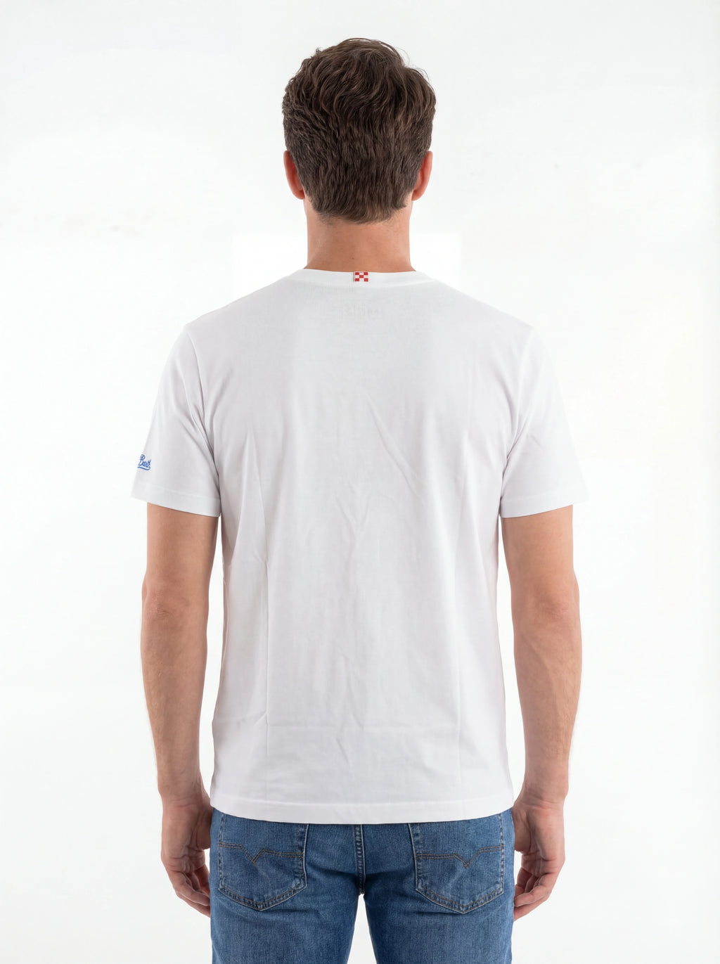 Modello a 45 gradi t-shirt bianco scritta “St.Barth” Saint Barth cotone