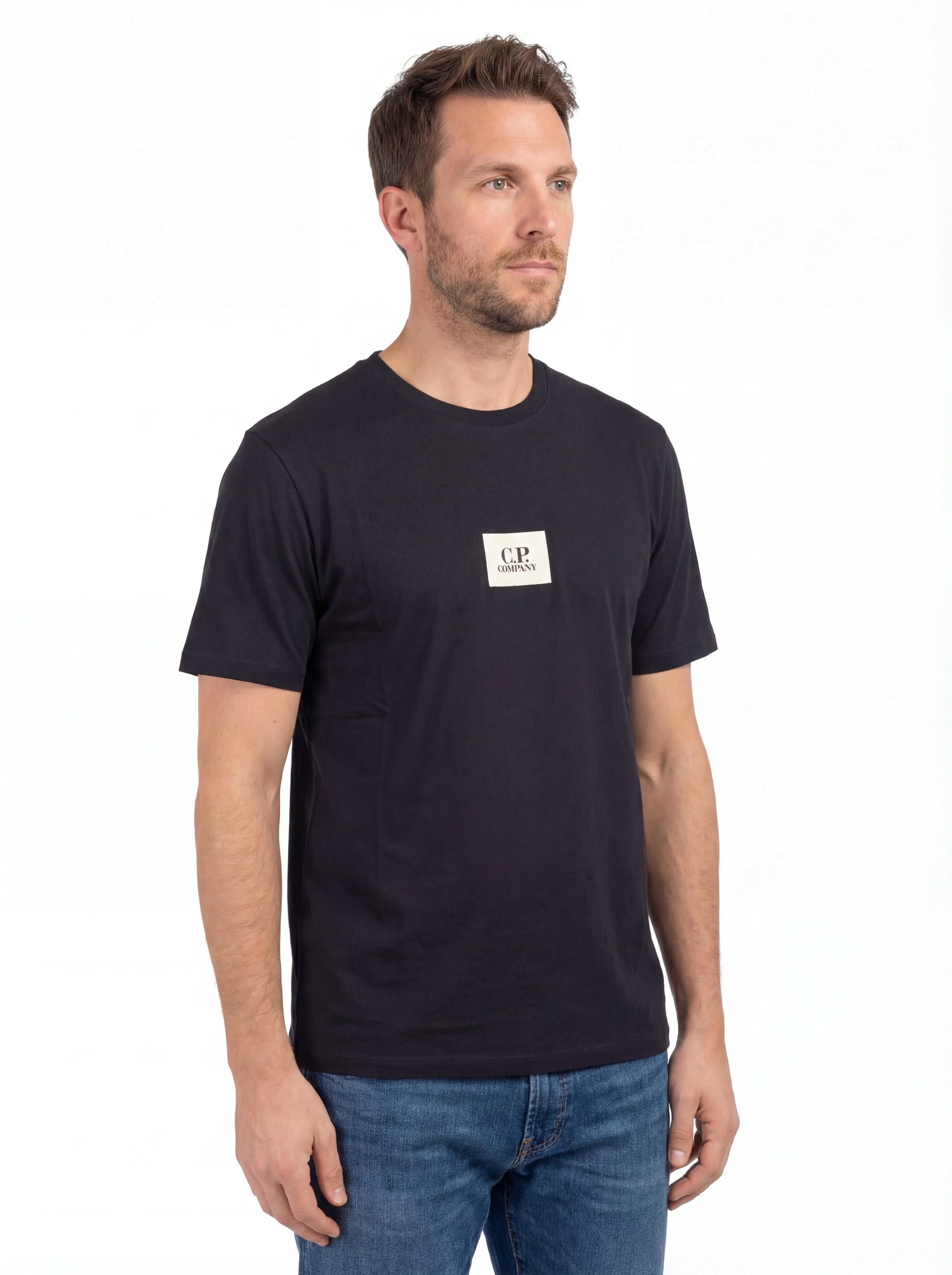 Modello a 45 gradi con t-shirt blu nan logo Stampa cotone jersey